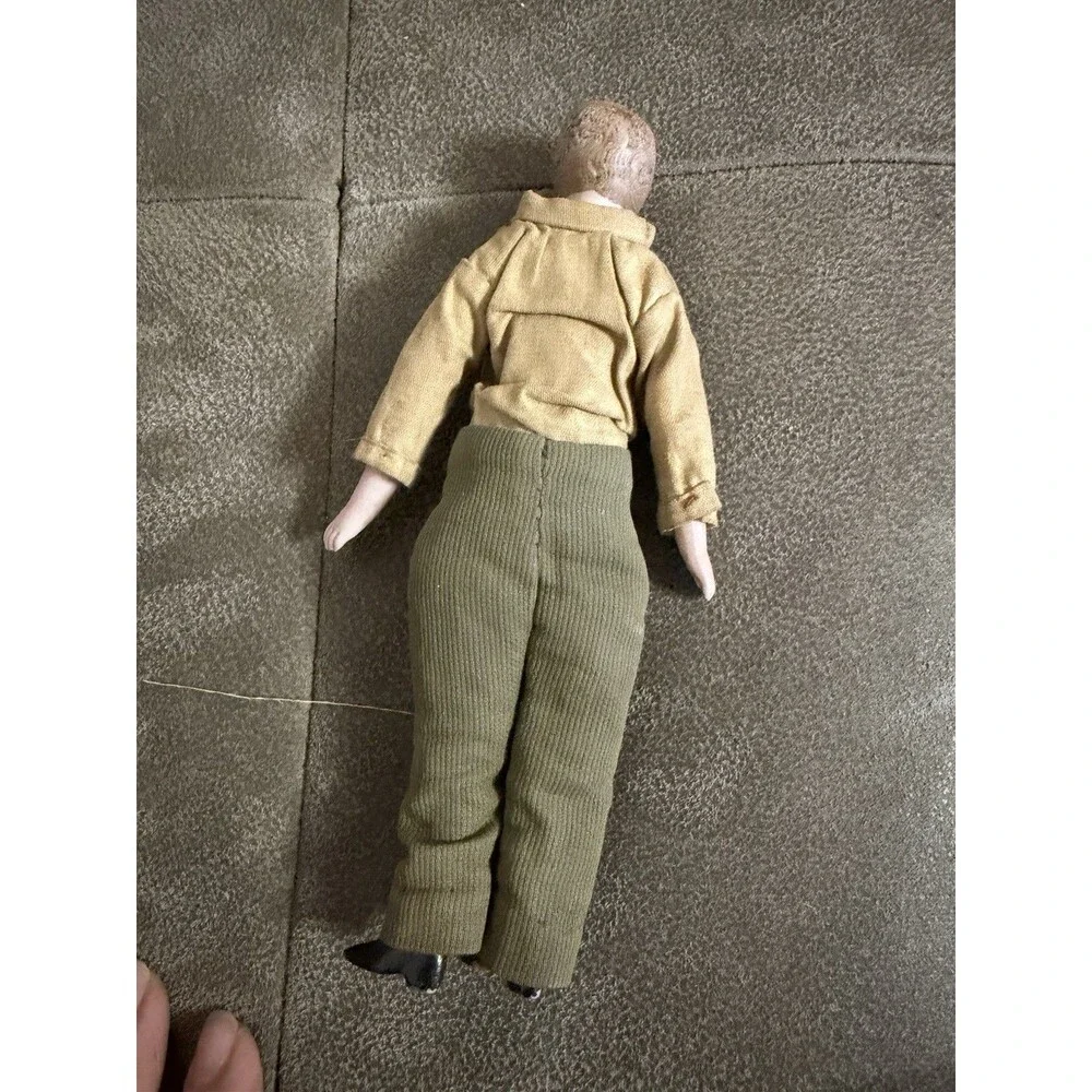 Antique German bisque gentleman doll, approximately 7 inches tall,